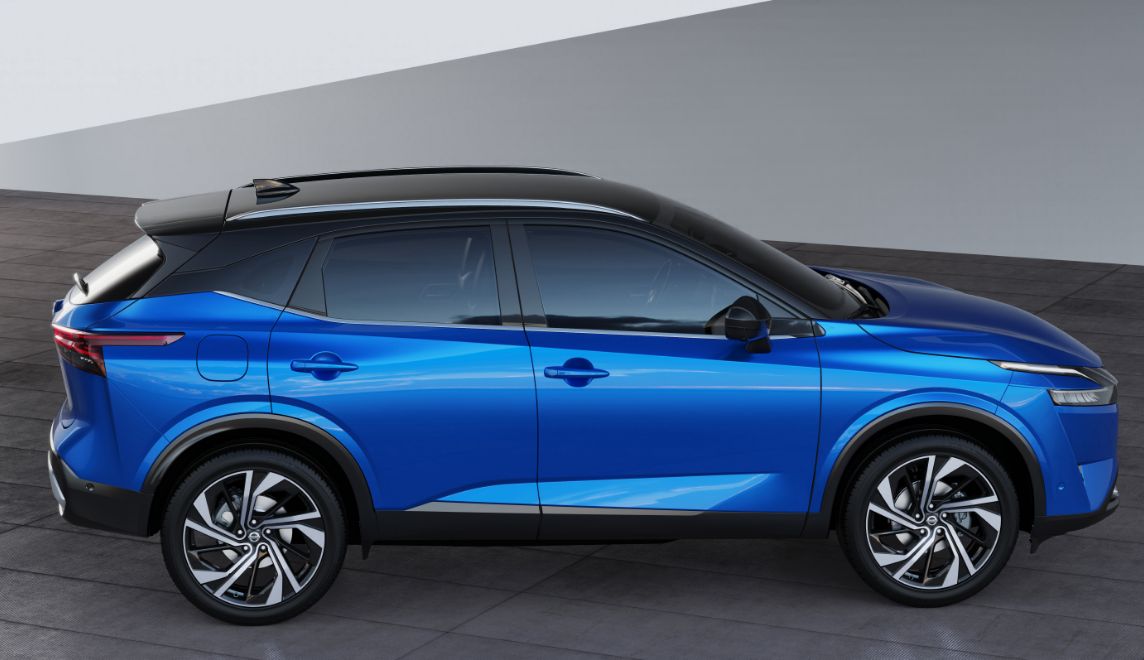 Blue Nissan Qashqai in full side profile