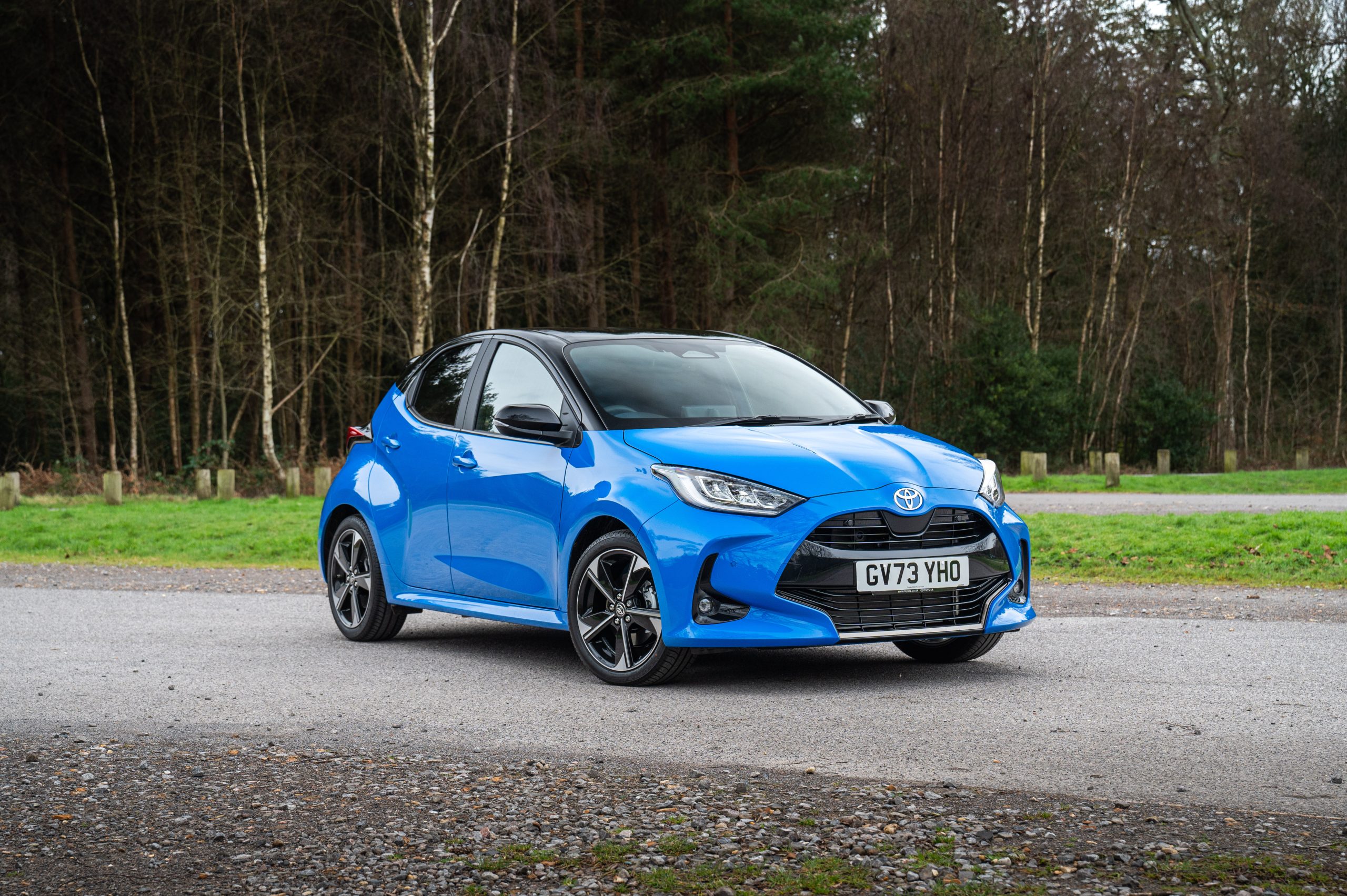 Blue Toyota Yaris, a small hatchback class example